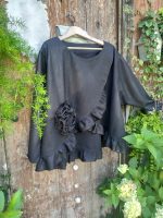 Gabriella Top charming long sleeves and elegant cross-front design