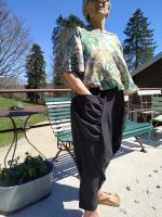 Modern sarouel pants inspired by traditional Hmong “Se” design – unisex drop-crotch style with colorful patchwork fabric